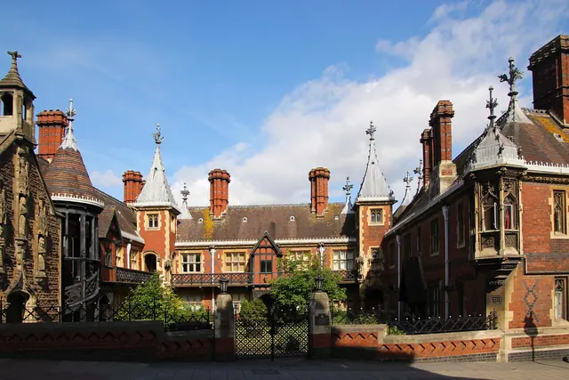 building, house, architecture, home, construction, estate, residential, property, design, exterior, residence, structure, roof, window, brick, rooftop, nobody, chimney, brown, wall