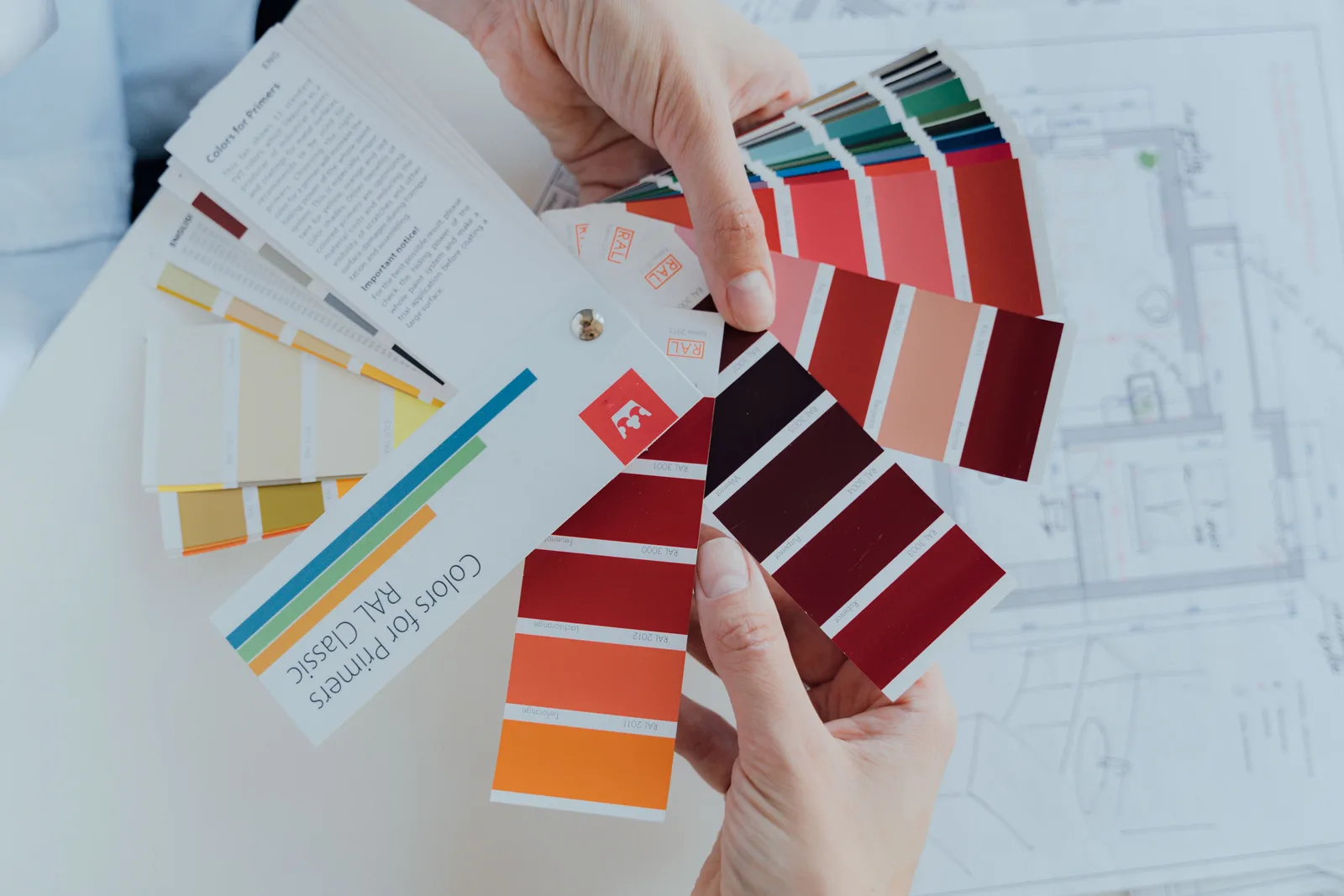 Person choosing color palettes for interior design projects, emphasizing creative choices. 4 things that decide period interior products worth testing