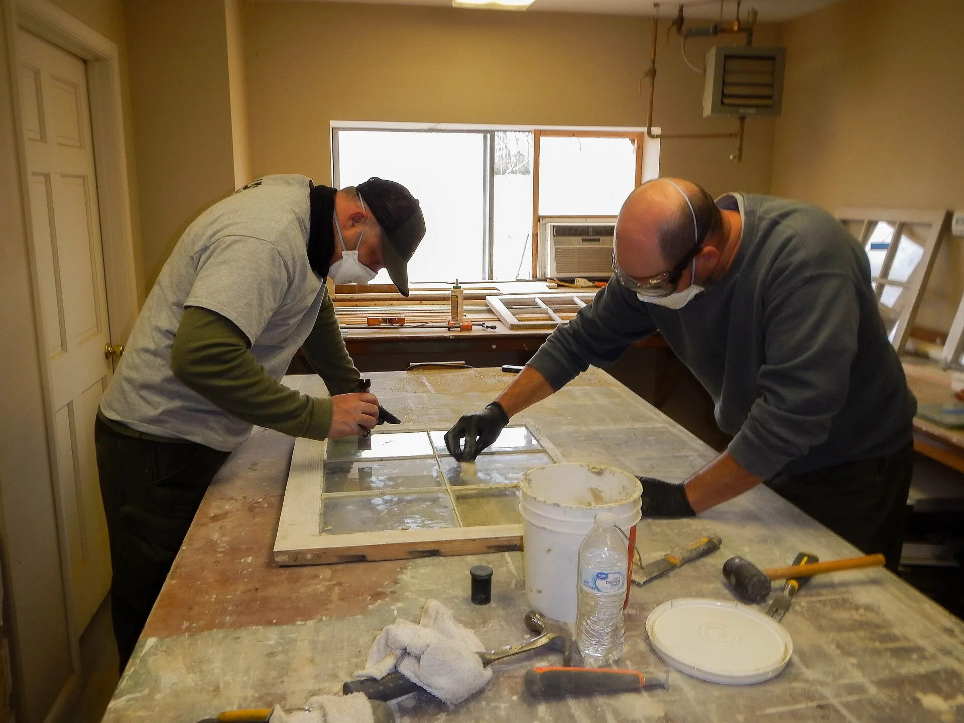Preservationists make repairs to historic window sashes from the Wisler house. These will be reinstalled in their original window frames. Keywords: gettysburg; gettysburg national military park; battlefield; reconstruction; civil war; homes; virtual experience; historic preservation. How to get a preservation contractor interested in a small job